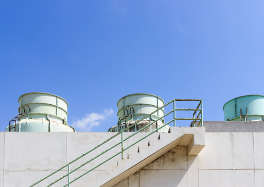 Non chemical alternative to bromine dosing at a cooling tower